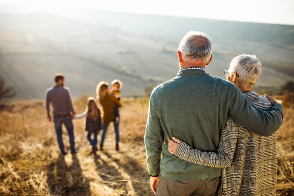 man and woman hugging looking over a family in front of them

treatment