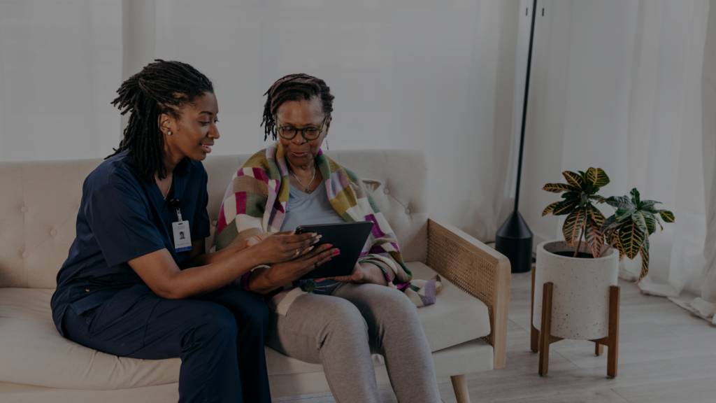 patient and caretaker looking at an ipad

patient and families