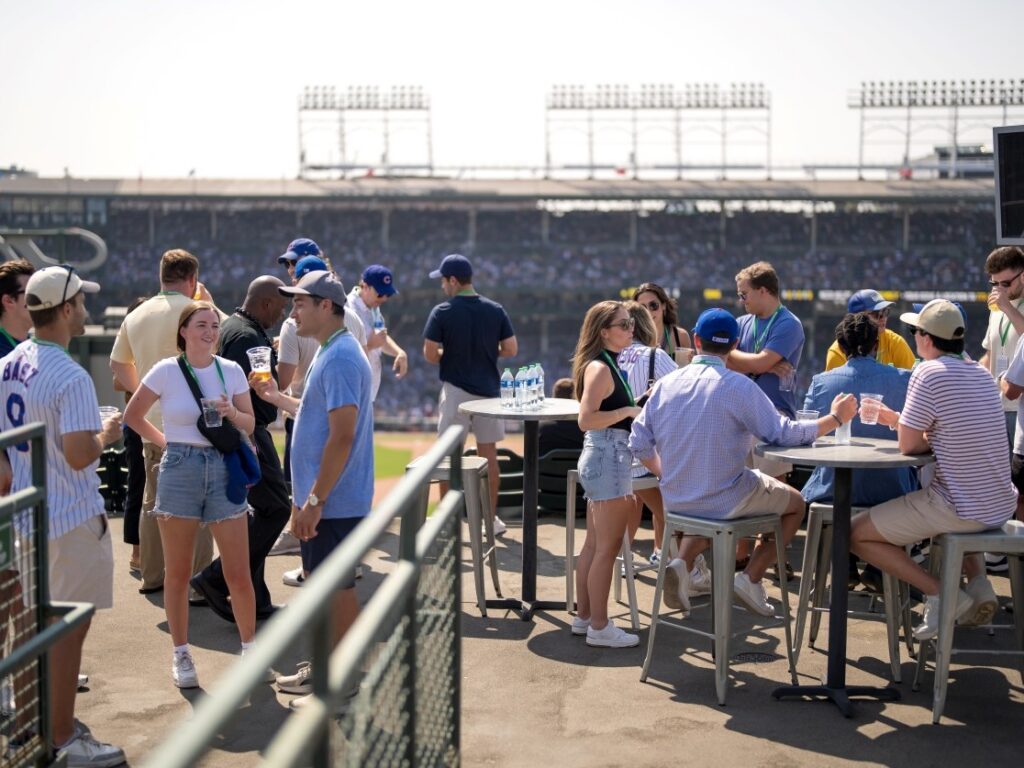 people standing around talking

Wrigley Rooftop Cubs night